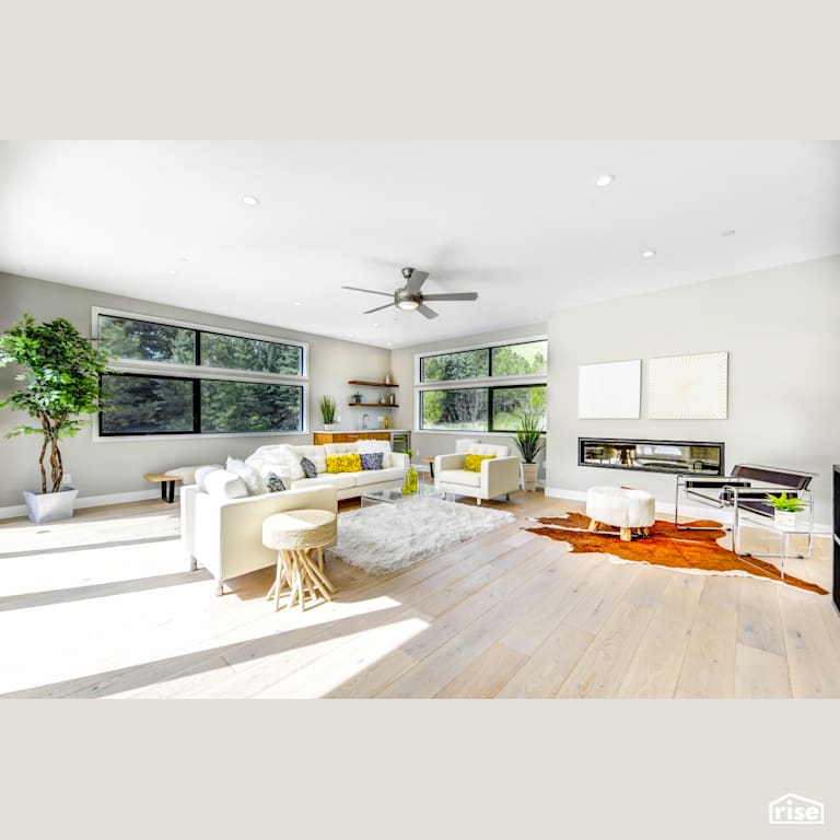 Open living room with triple glazed windows with FSC Certified Hardwood by Alpen High Performance Products