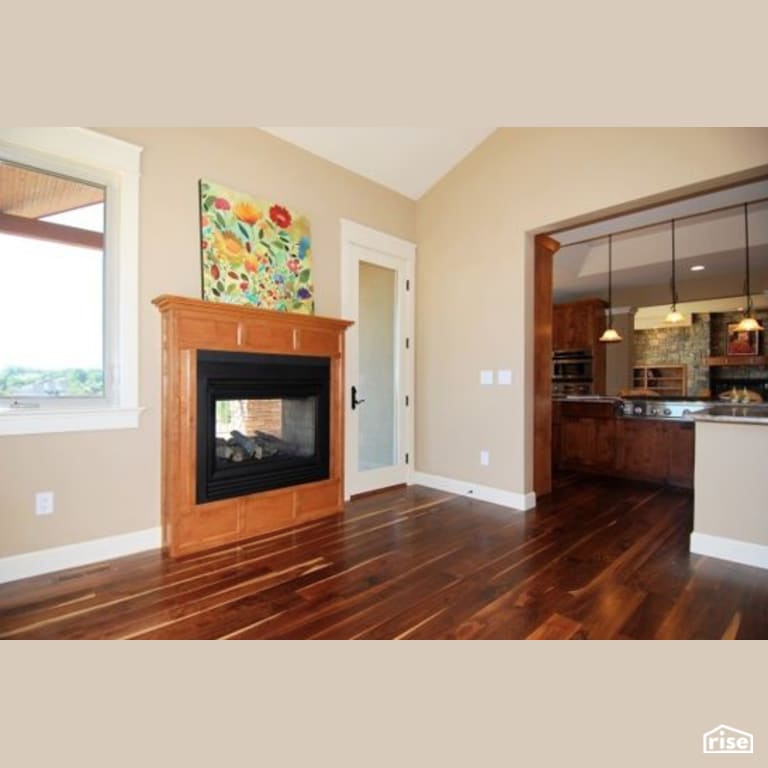 Family Room with Gas Fireplace by Constructive Builders