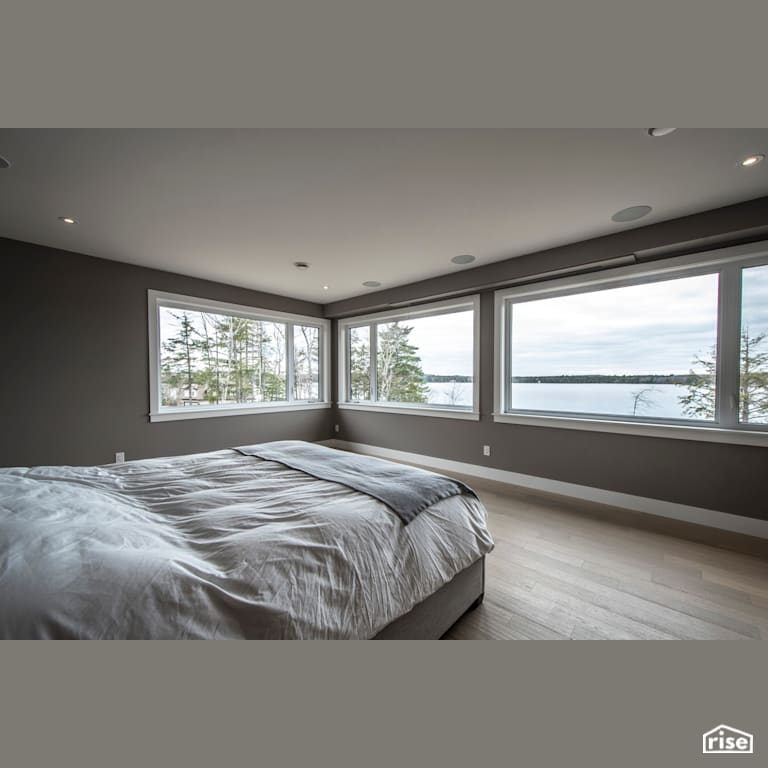 Bridge Over Water - Master Bedroom with FSC Certified Hardwood by Homes by Highgate