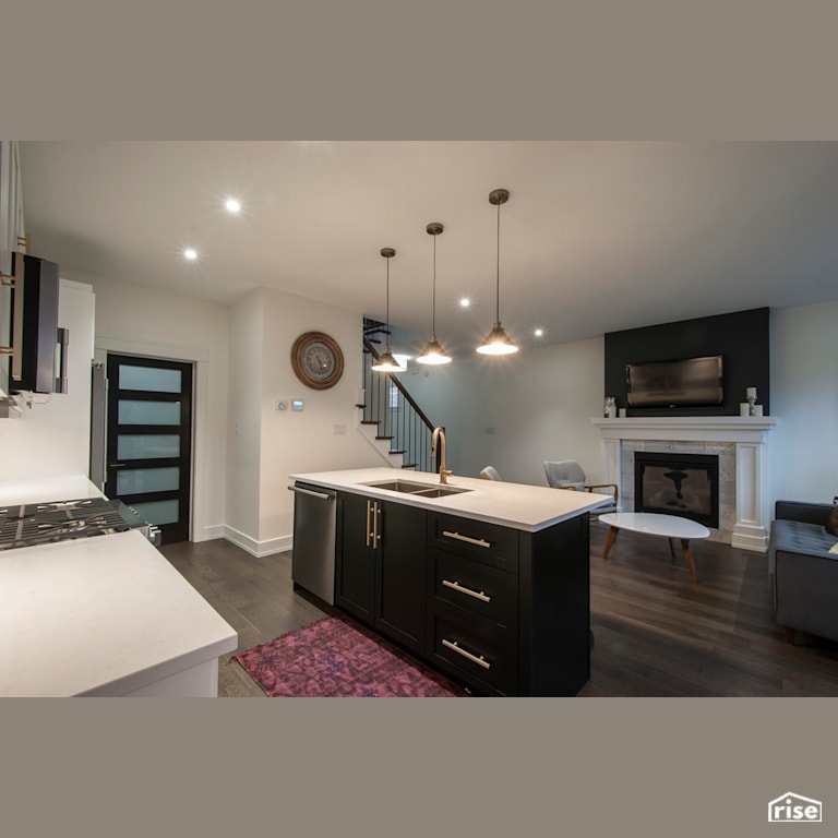 The Fleetview - Kitchen with Gas Fireplace by Bowers Construction