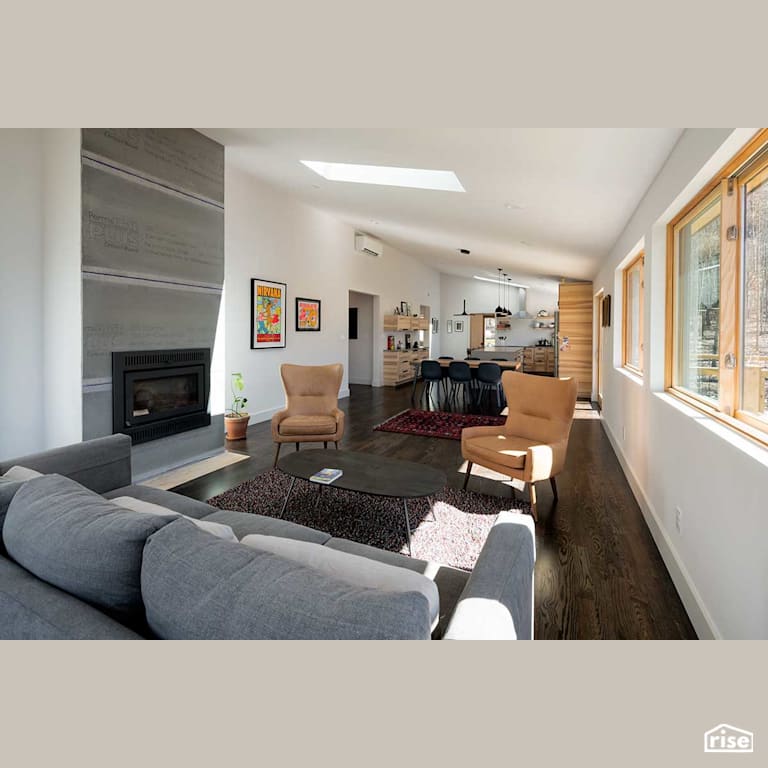 Open concept living room with Gas Fireplace by Deltec Homes