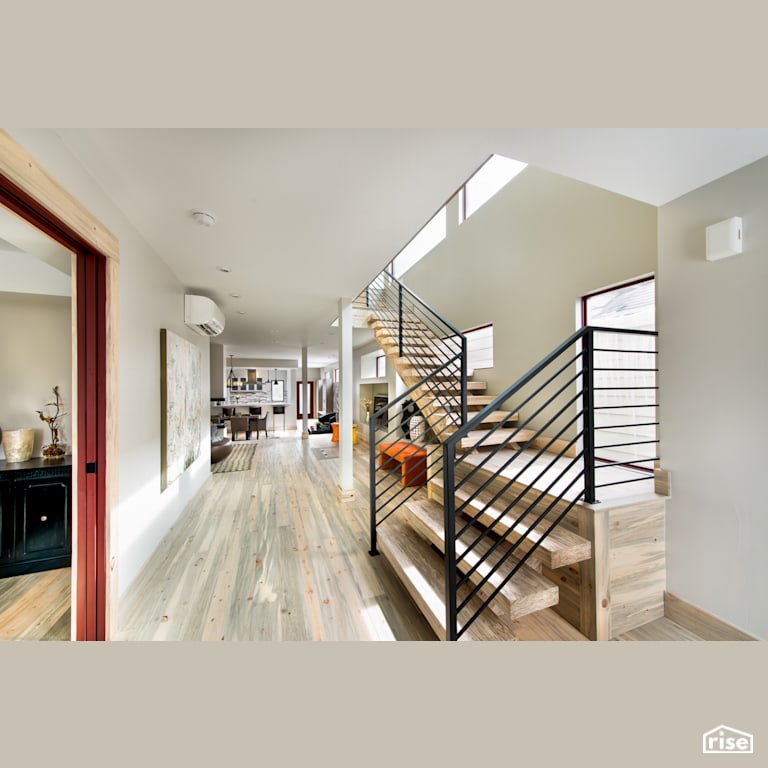 Entryway with floating wood staircase to second floor with FSC Certified Hardwood by Alpen High Performance Products