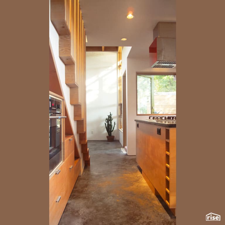 Hallway with Wood Window Frame by MIZA Architects