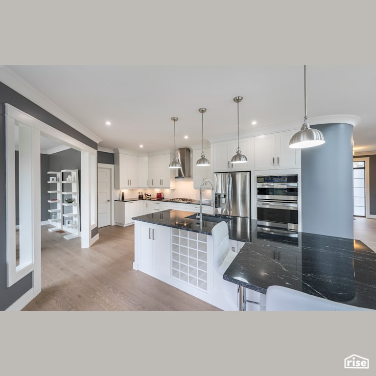 Executive Living - Kitchen with Gas Range by Homes by Highgate