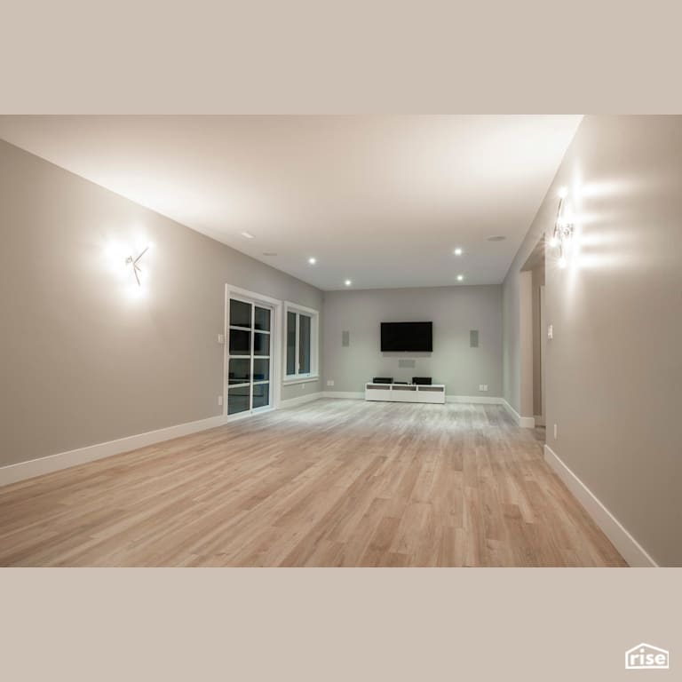 Modern Retreat - Family Room with Energy Star Exterior Door by Homes by Highgate