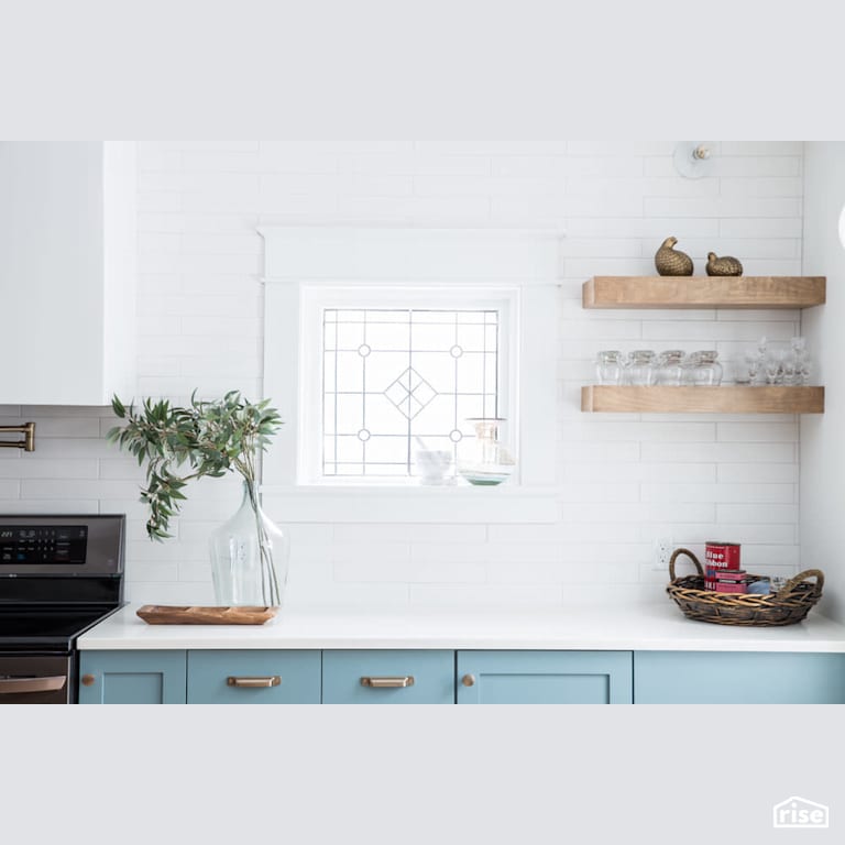 White subway tile backsplash on white countertop with Wall Light by Reimagine Designs