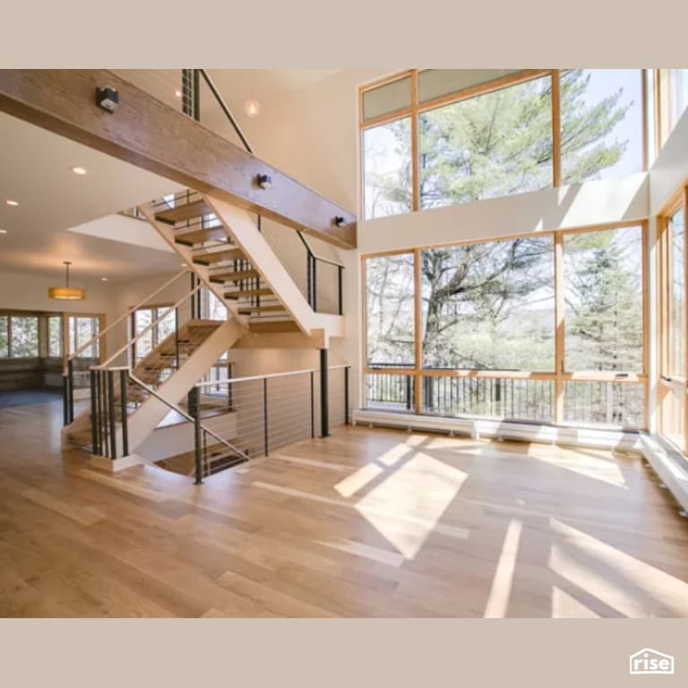 Living Room with Fixed Window by Constructive Builders