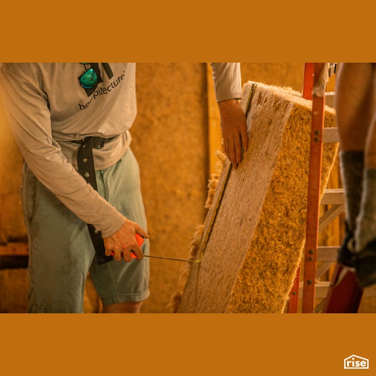 Measuring HempWool Batt Insulation with Hemp Batt Insulation by Hempitecture