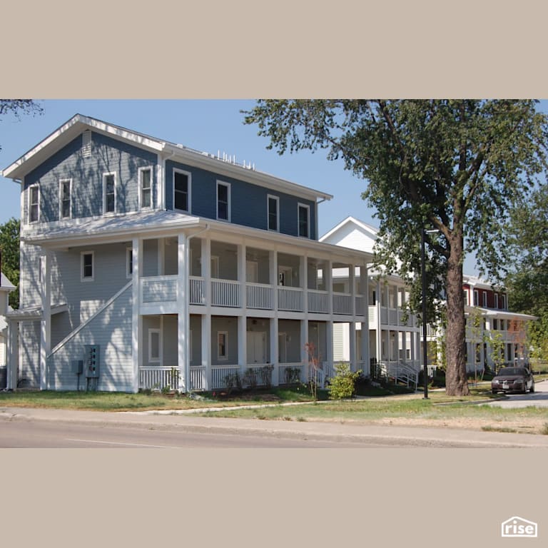 Row of multi-story townhomes with energy efficient windows with Triple Pane Window by Alpen High Performance Products