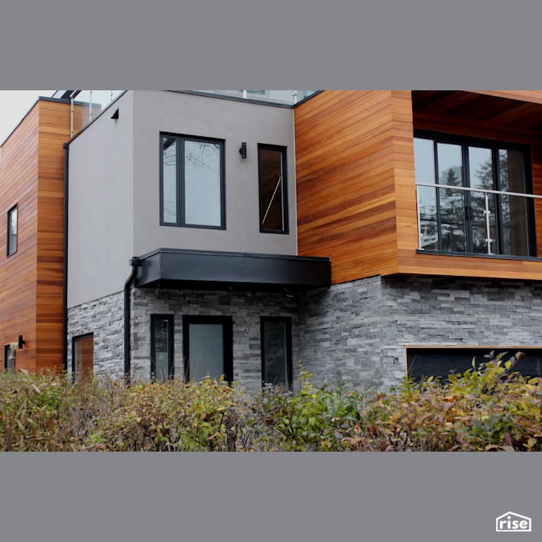 House with multiple types of siding with Stone Siding by Masonal Stone Inc