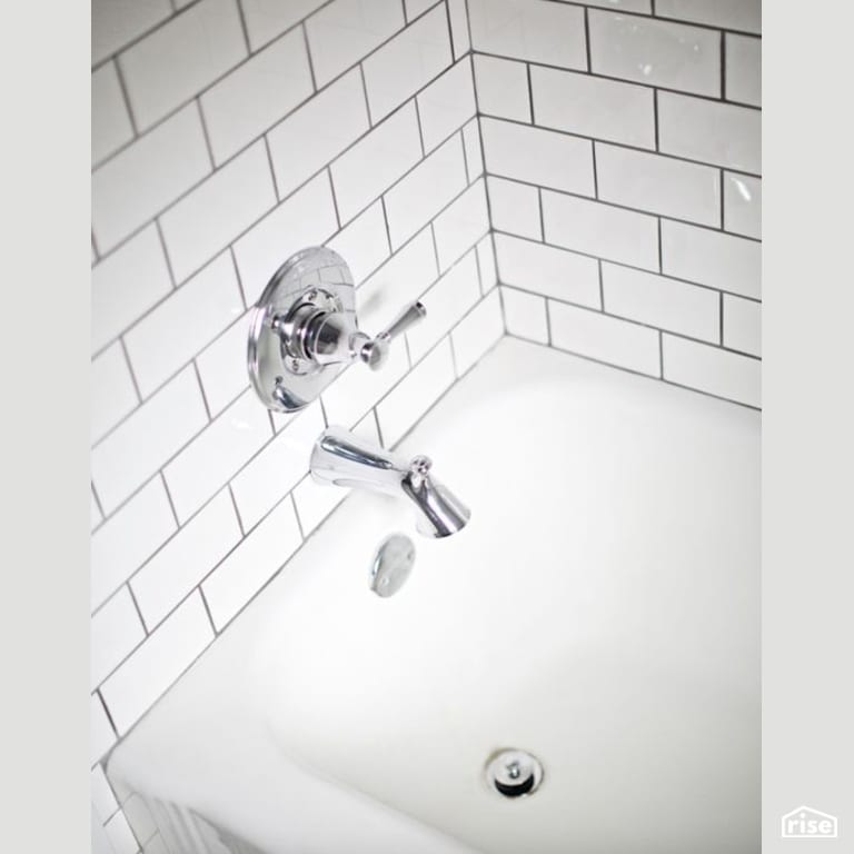 Custom Bathroom Tub with Low-Flow Bathroom Faucet by Constructive Builders