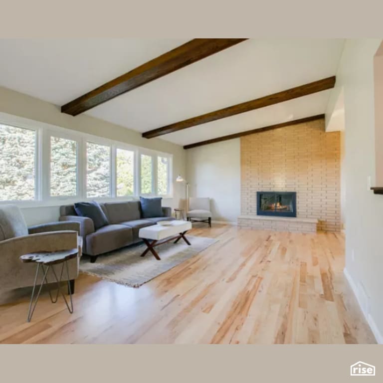 Living Room with Gas Fireplace by Constructive Builders