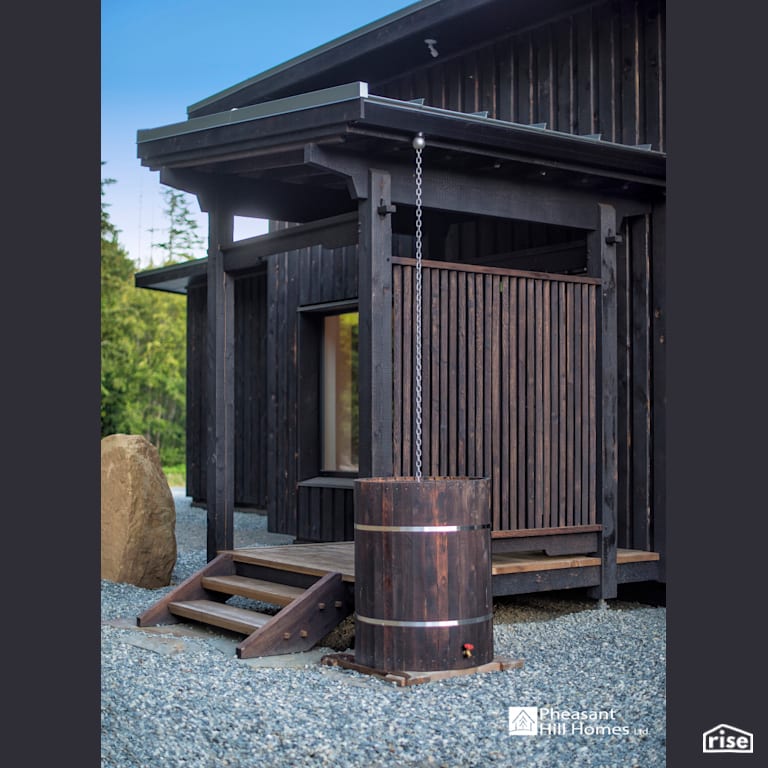 Yakisugi Passive House with Rainwater Barrel by Pheasant Hill Homes Ltd.