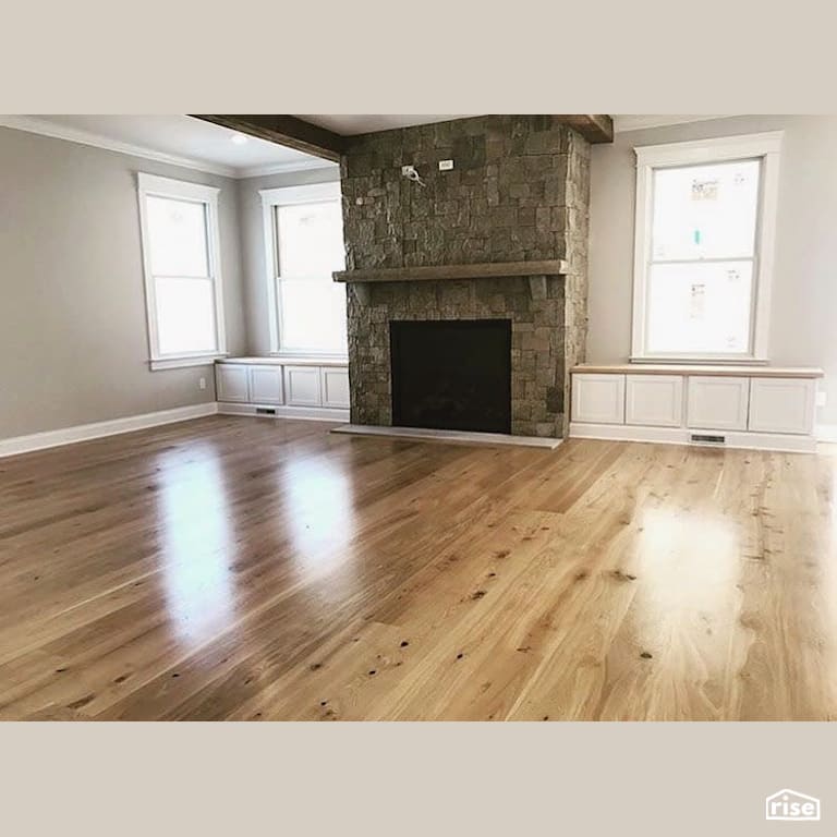 Finished floors around stone fireplace with Interior Wood Finish by Vermont Natural Coatings