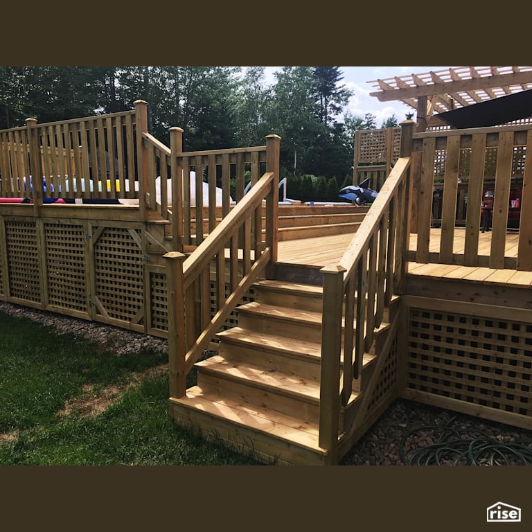 Backyard Deck with Pressure Treated Decking by Earthworks Landscape & Design