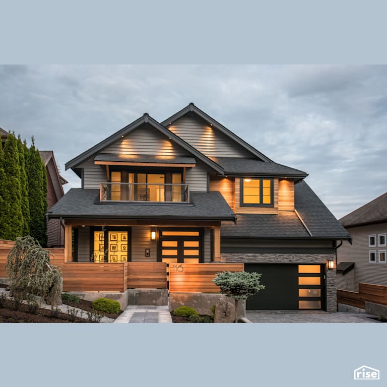 Front Exterior with Accent Outdoor Lighting by My House Design/Build Team Ltd.