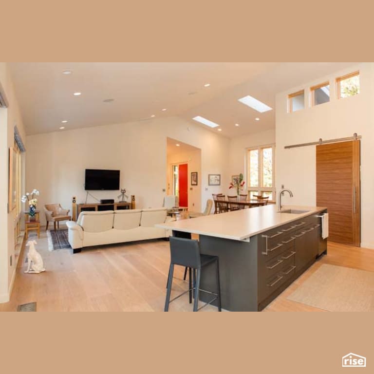 Kitchen and Living Room with Low-Flow Kitchen Faucet by Winsome Construction