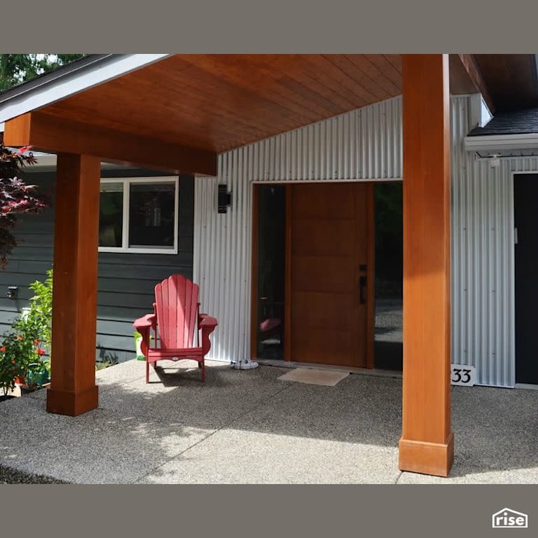 Copper Island Fine Homes - Entryway with Shiplap Wood Siding by Copper Island Fine Homes Inc.