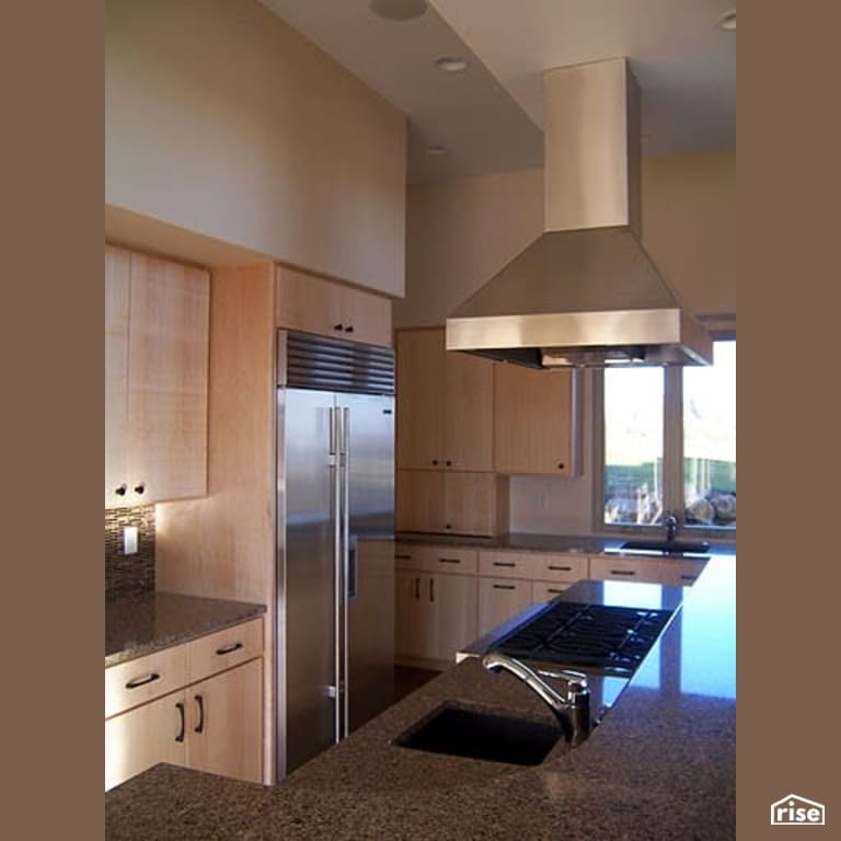 Kitchen with Gas Range by Winsome Construction
