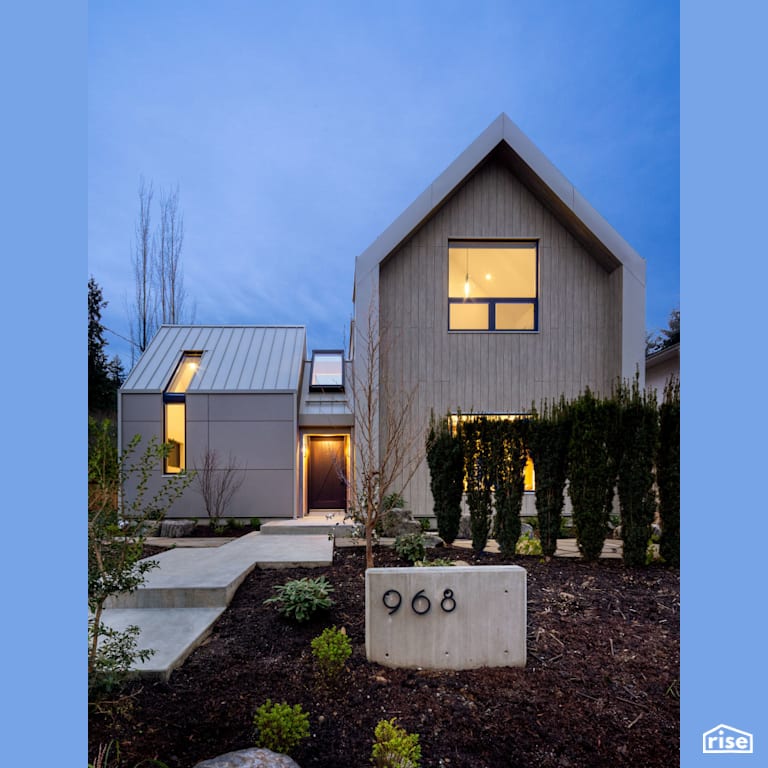 Backyard of Modern Home with Stone Grey Exterior with Mineral Wool Batt Insulation by Synthesis Design