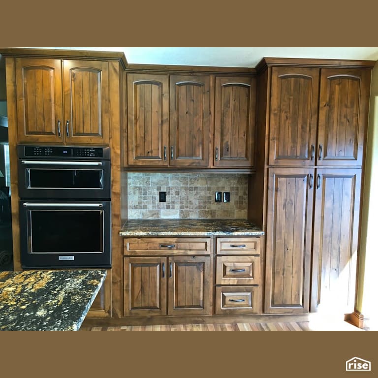 Wood kitchen cabinets with wall oven with Wall Oven by Revolve Design Build