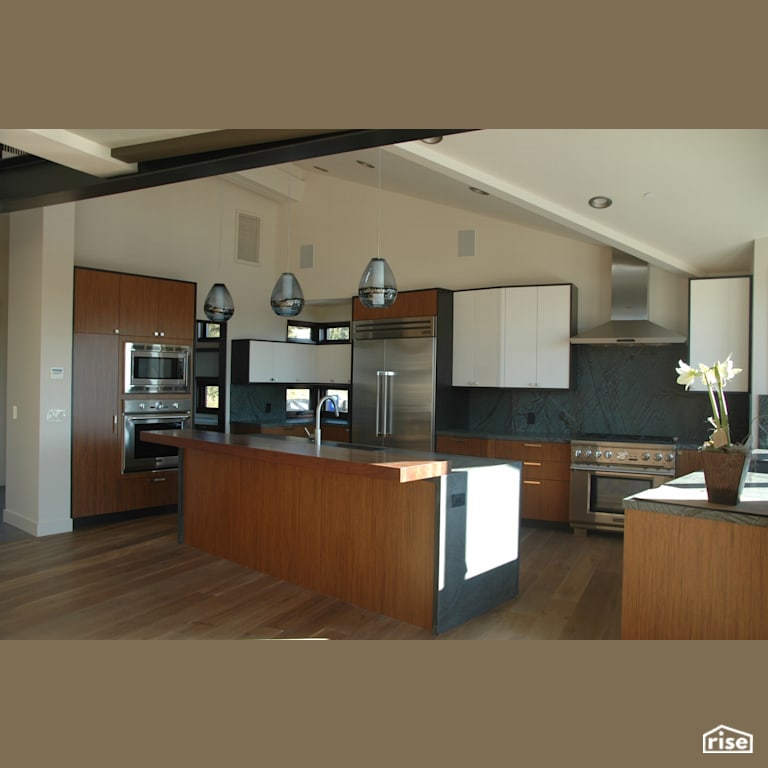 Kitchen with Low-Flow Kitchen Faucet by Alliance Green Builders