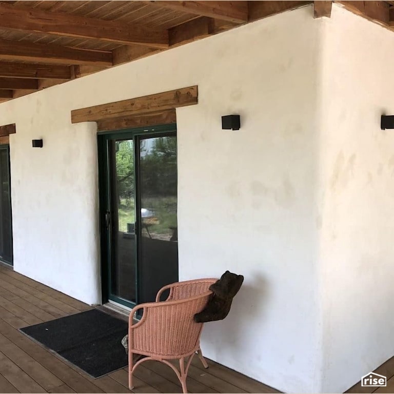 Texas compressed earth block home entryway with Accent Outdoor Lighting by TexaTerra Block