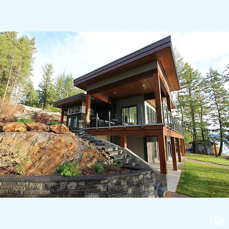 Copper Island Fine Homes - Exteriors with Shiplap Wood Siding by Copper Island Fine Homes Inc.