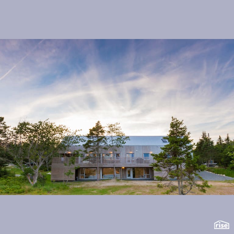 Coastal Home - Exterior with Accent Outdoor Lighting by Brad Goodsell Design | Build Inc