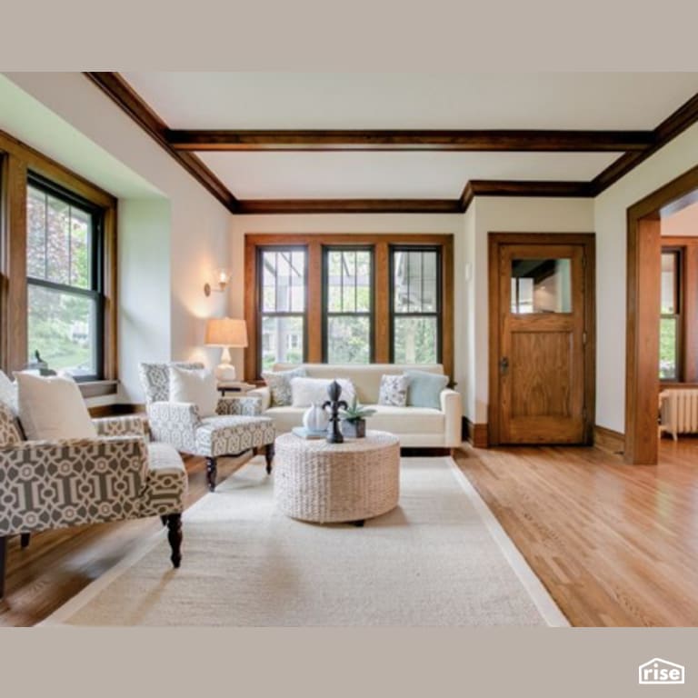 Living Room with Solid Wood Door by Constructive Builders