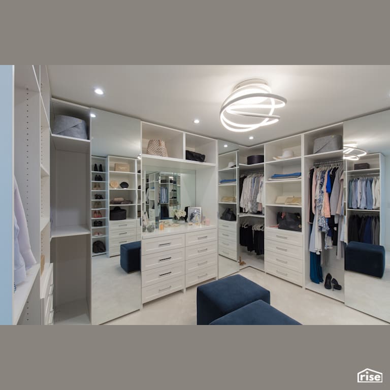 Walk in Closet with Plenty of Storage with Carpeting by Synthesis Design