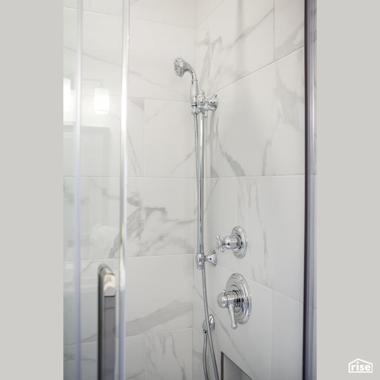 White tiled shower refresh with Low-Flow Showerhead by J Russon Construction