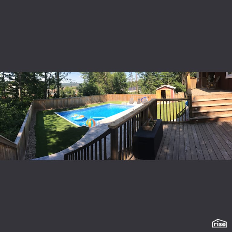 Backyard Deck and Landscaping Around Pool with Pressure Treated Decking by Earthworks Landscape & Design