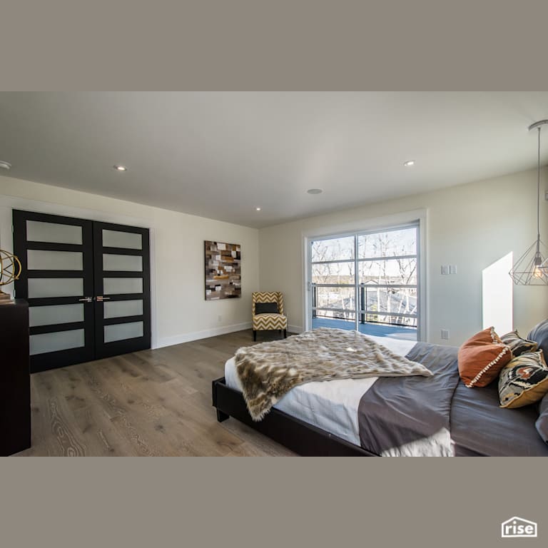 The Tempranillo - Master Bedroom with Laminate Flooring by Bowers Construction