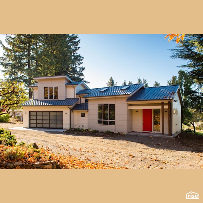 Home Exterior with Fixed Window by Winsome Construction