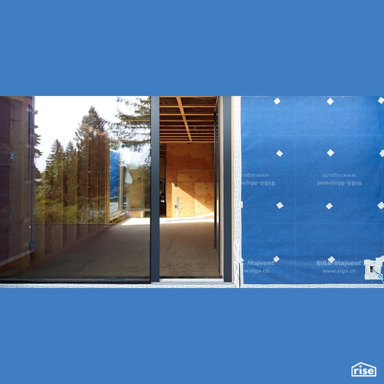 Vapor control layer around sliding patio door with Vapor Control Layer by SIGA North America