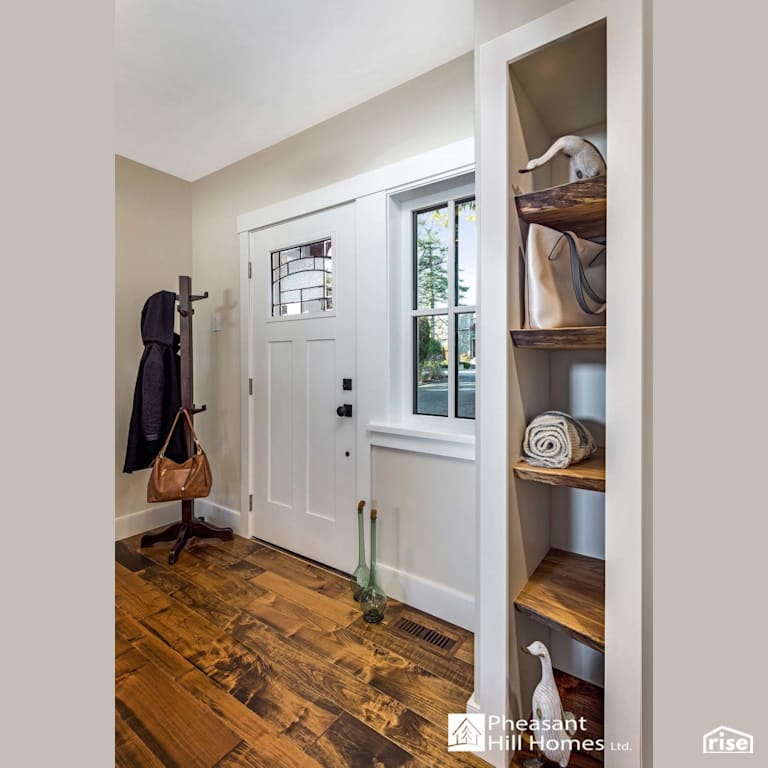 Entryway Shelving with Triple Pane Window by Pheasant Hill Homes Ltd.