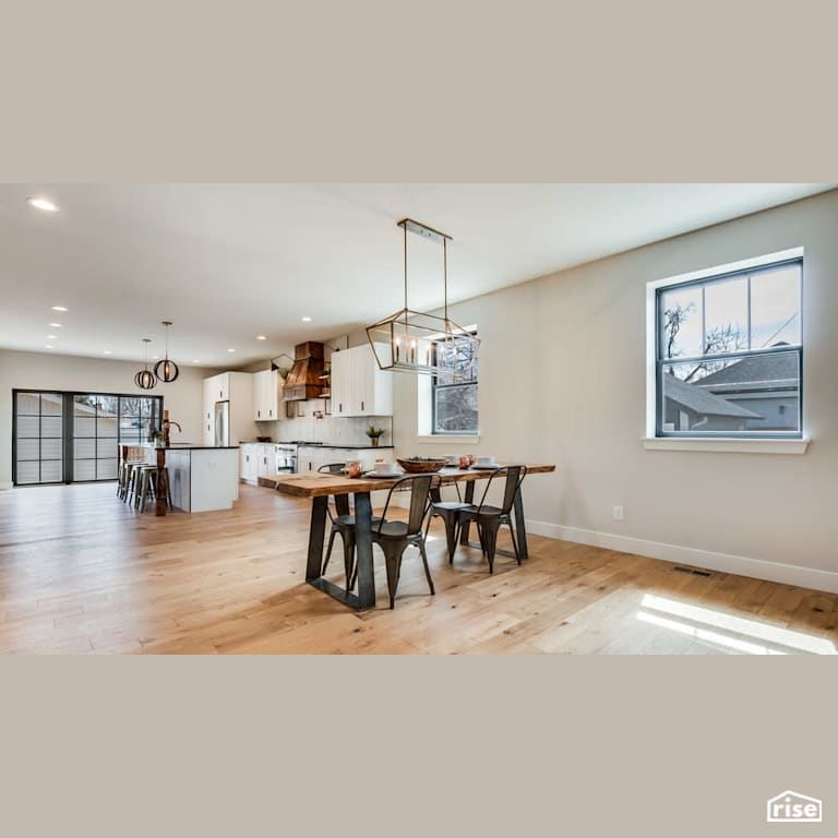 Dining room with live edge dining table with Integrated LED by Revolve Design Build