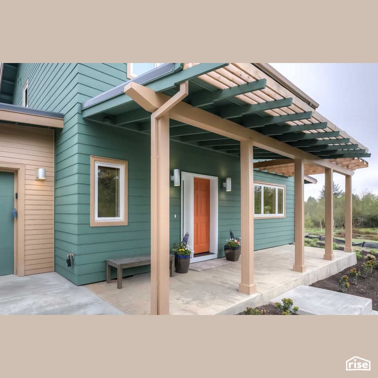 Exterior Entryway with Clapboard Wood Siding by Winsome Construction