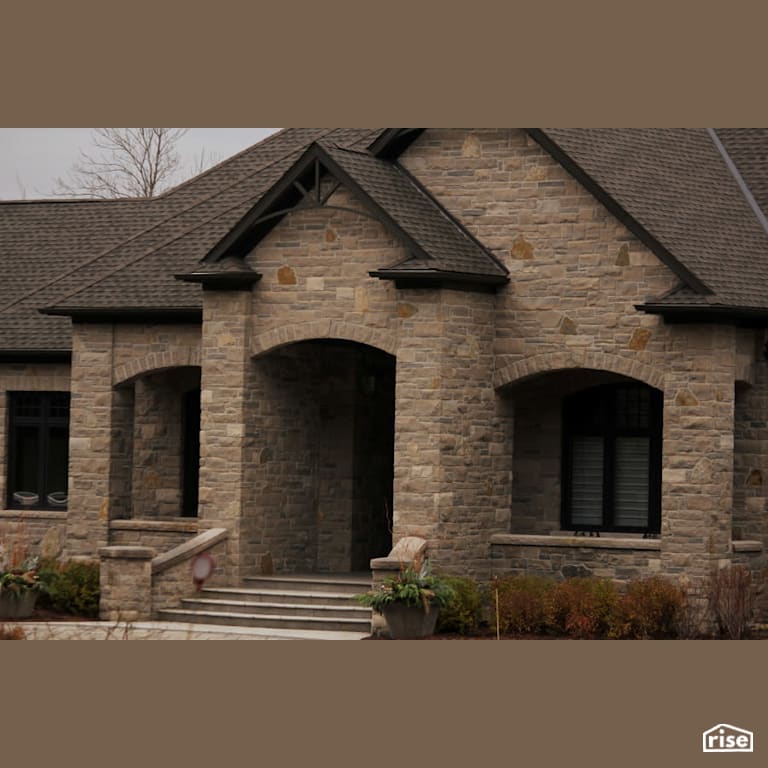 Front of House - Complete in Stone Siding with Stone Siding by Masonal Stone Inc