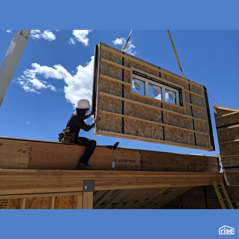 H14 panelized prefab Passive House second floor wall installation with Prefabricated Panelized Home by Phoenix Haus LLC