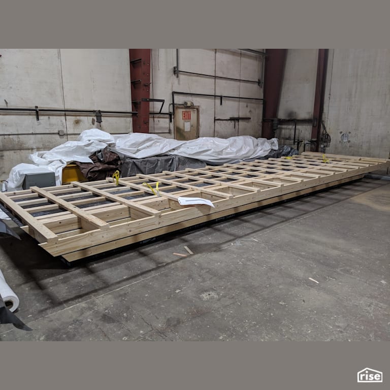 Wall Panel on the Shop Floor with Prefabricated Panelized Home by Phoenix Haus LLC