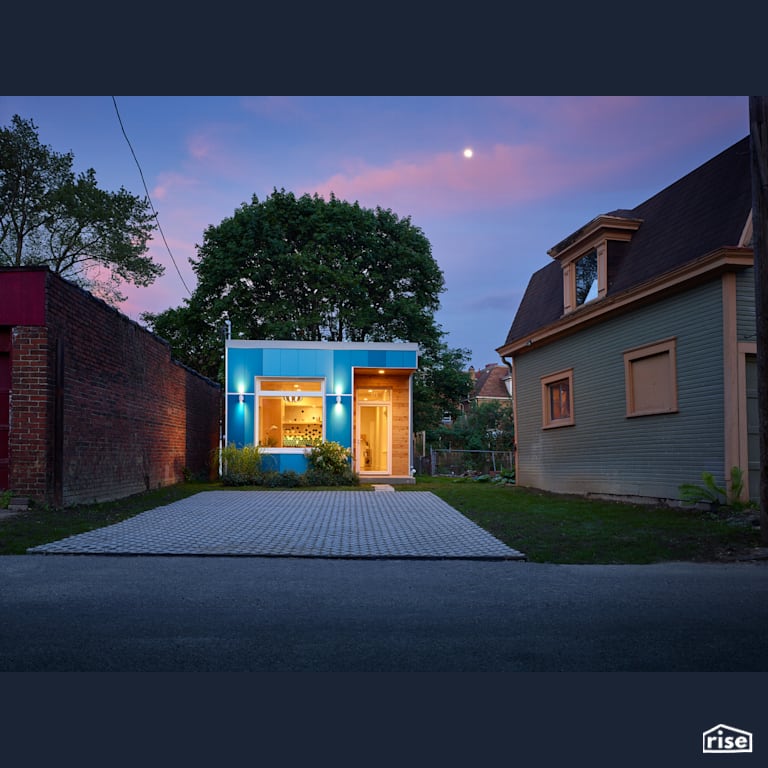 Latham Front Exterior In The Evening with Shiplap Wood Siding by Module