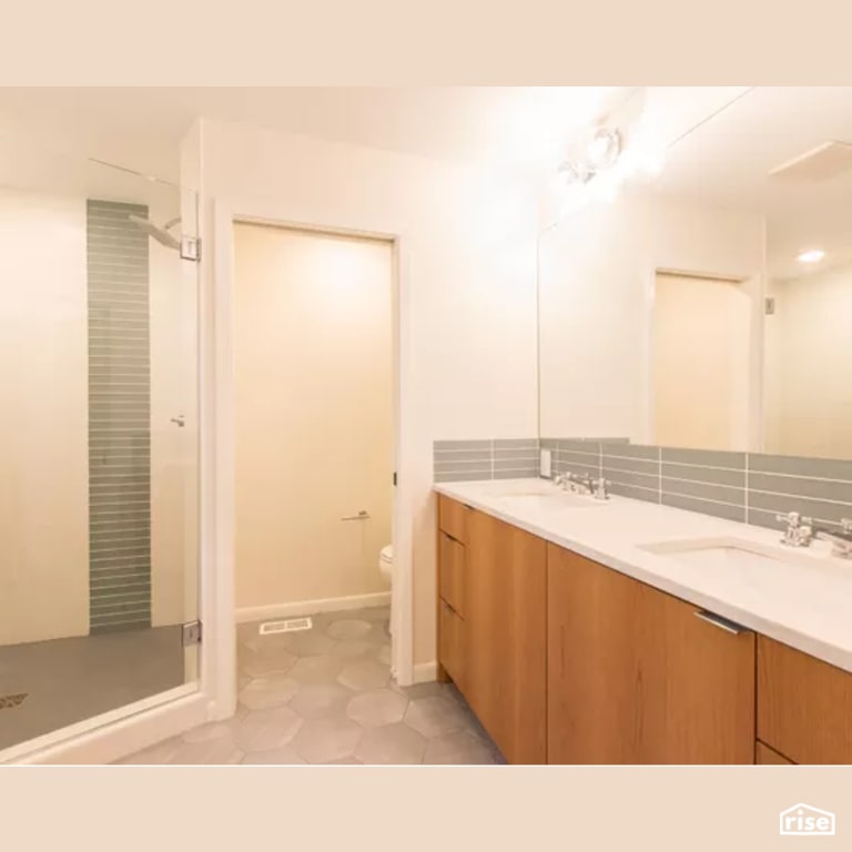 Bathroom with Ceramic Tile Floors by Constructive Builders