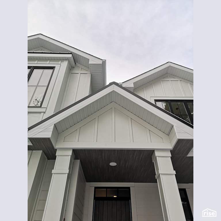 White composite siding with grey composite soffits with Composite or Engineered Siding by ChamClad by Chameleon