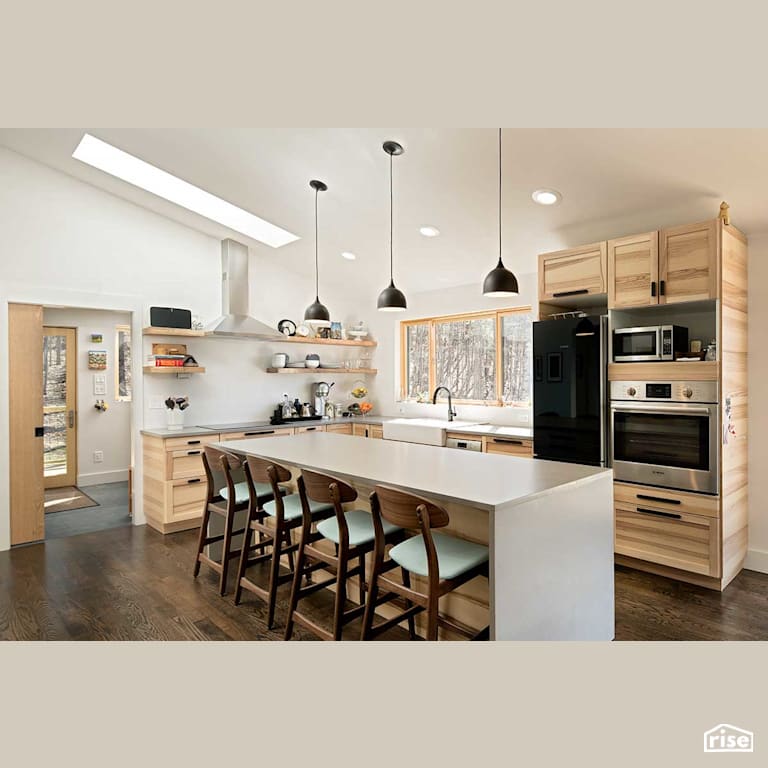 Open concept kitchen with Integrated LED by Deltec Homes