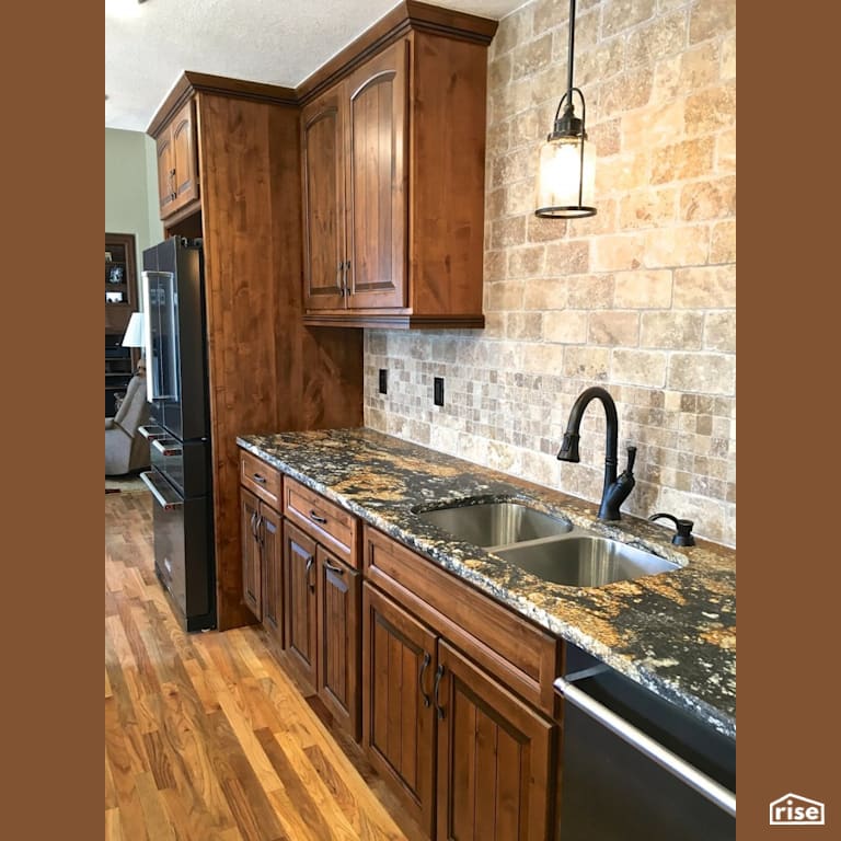 Kitchen sink with tile backsplash with Low-Flow Kitchen Faucet by Revolve Design Build