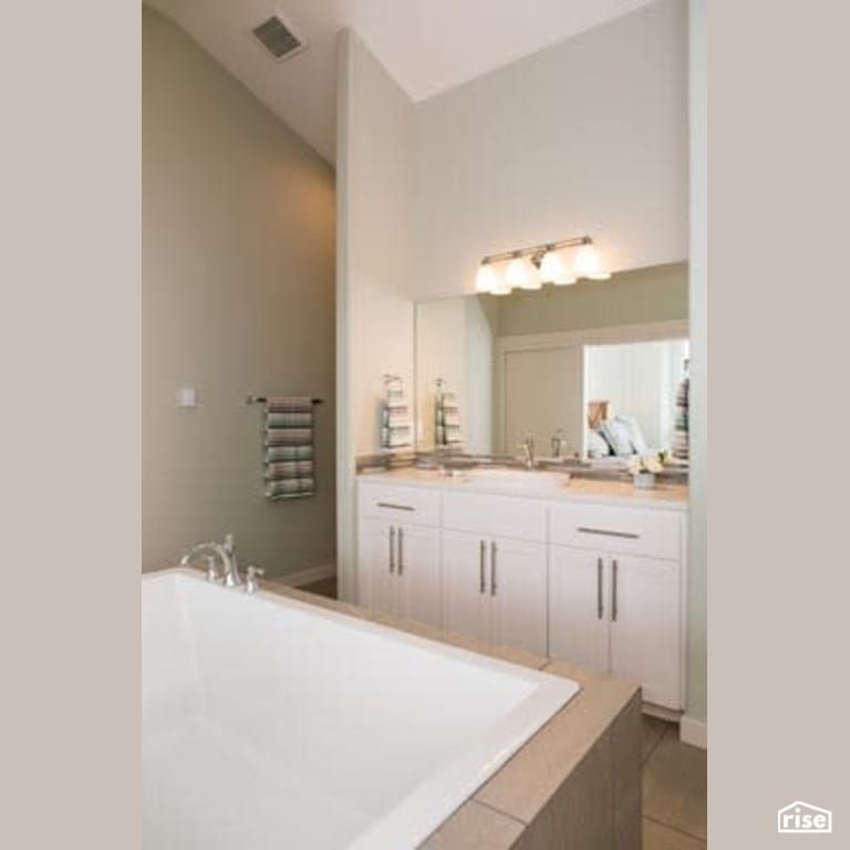 Ensuite Bathroom with Low-Flow Bathroom Faucet by Winsome Construction