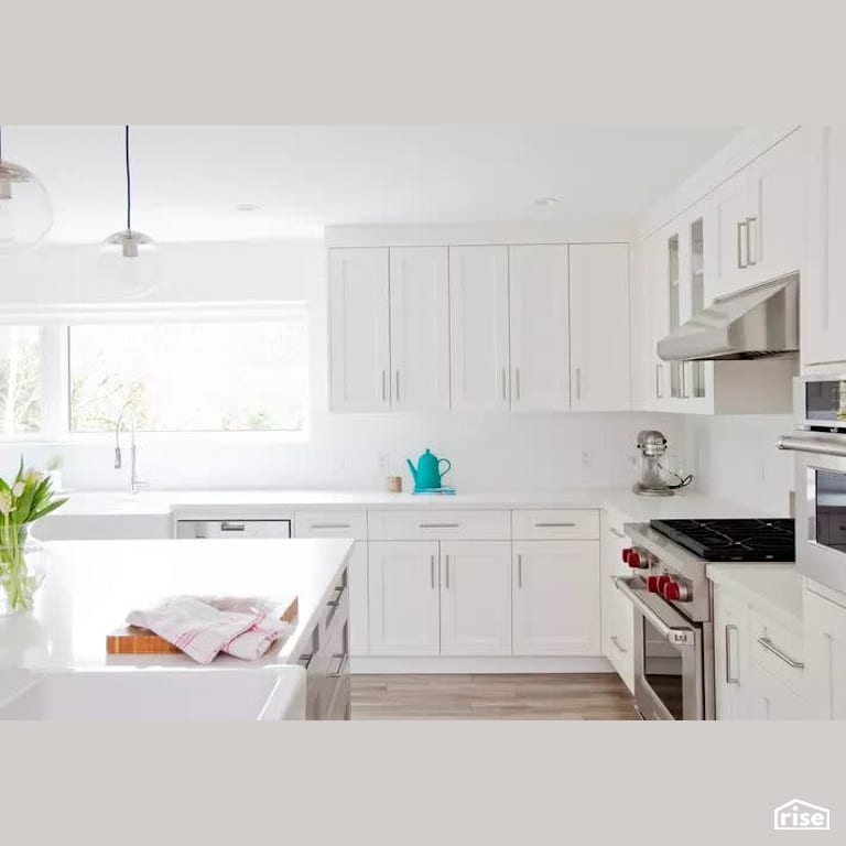 Marine Drive Renovation - Kitchen with Gas Range by B Collective Homes