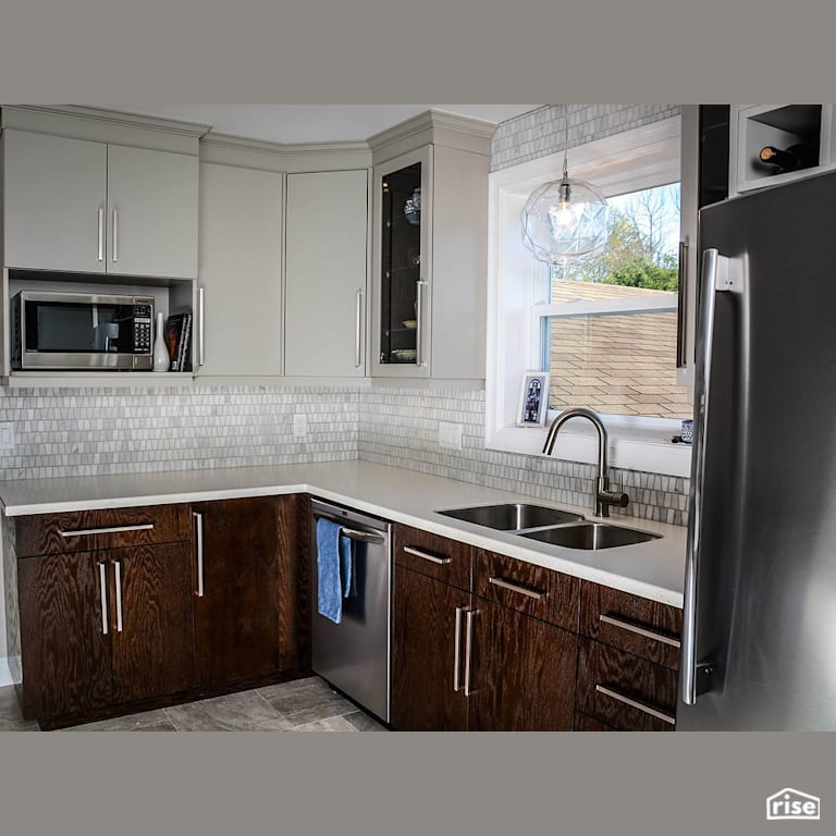 Brown Cabinet Renovation with Low-Flow Kitchen Faucet by Home Fashions